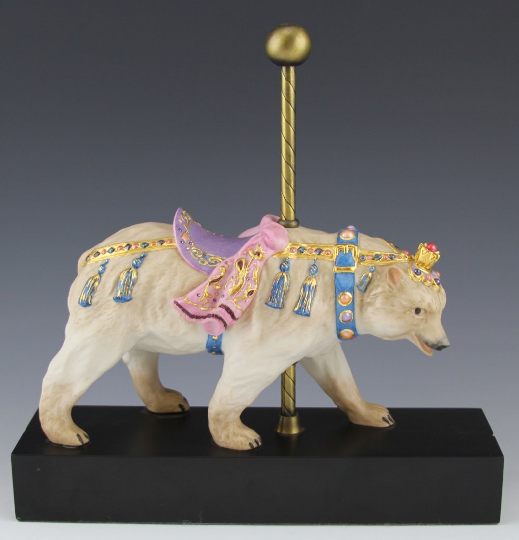 CYBIS PORCELAIN CAROUSEL FIGURE BEAR: CYBIS PORCELAIN CAROUSEL FIGURE BEAR Cybis porcelain carousel bear with wooden stand. Bottom is marked #30 and signed. Size: 9"