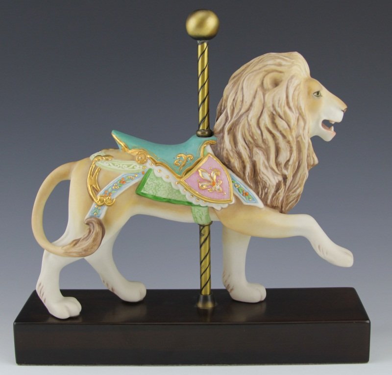 CYBIS PORCELAIN CAROUSEL FIGURE LION: CYBIS PORCELAIN CAROUSEL FIGURE LION Cybis porcelain carousel lion with wooden stand. Bottom is marked #433 and signed. Size: 5"