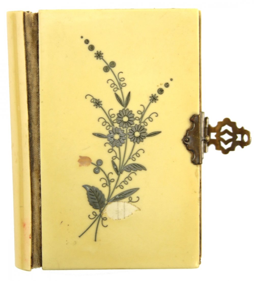 SMALL IVORY COVER PRAYER BOOK: SMALL IVORY COVER PRAYER BOOK Small, ivory cover prayer book with floral design on the front cover and clasp on the side. Copyright, 1884, by Benziger Brothers. Size: 4 x 1"