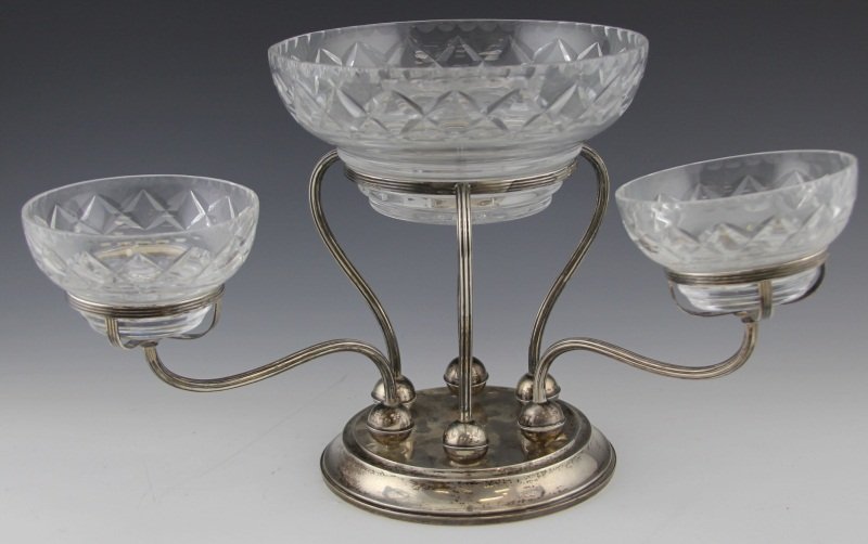 GORHAM STERLING AND CUT CRYSTAL EPERGNE: GORHAM STERLING AND CUT CRYSTAL EPERGNE Gorham sterling and cut crystal epergne with a weighted base, and four bowls. Three of the bowls are smaller and measure 4.5 x 2.5" and the large center bowl me