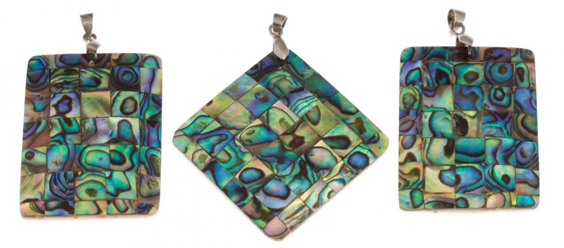 (3) ABALONE PENDANTS: (3) ABALONE PENDANTS A group of three abalone pendants, two rectangular, one square. Weight: 36.6g Size: 1.5 x 1.25", 1.4 x 1.4"