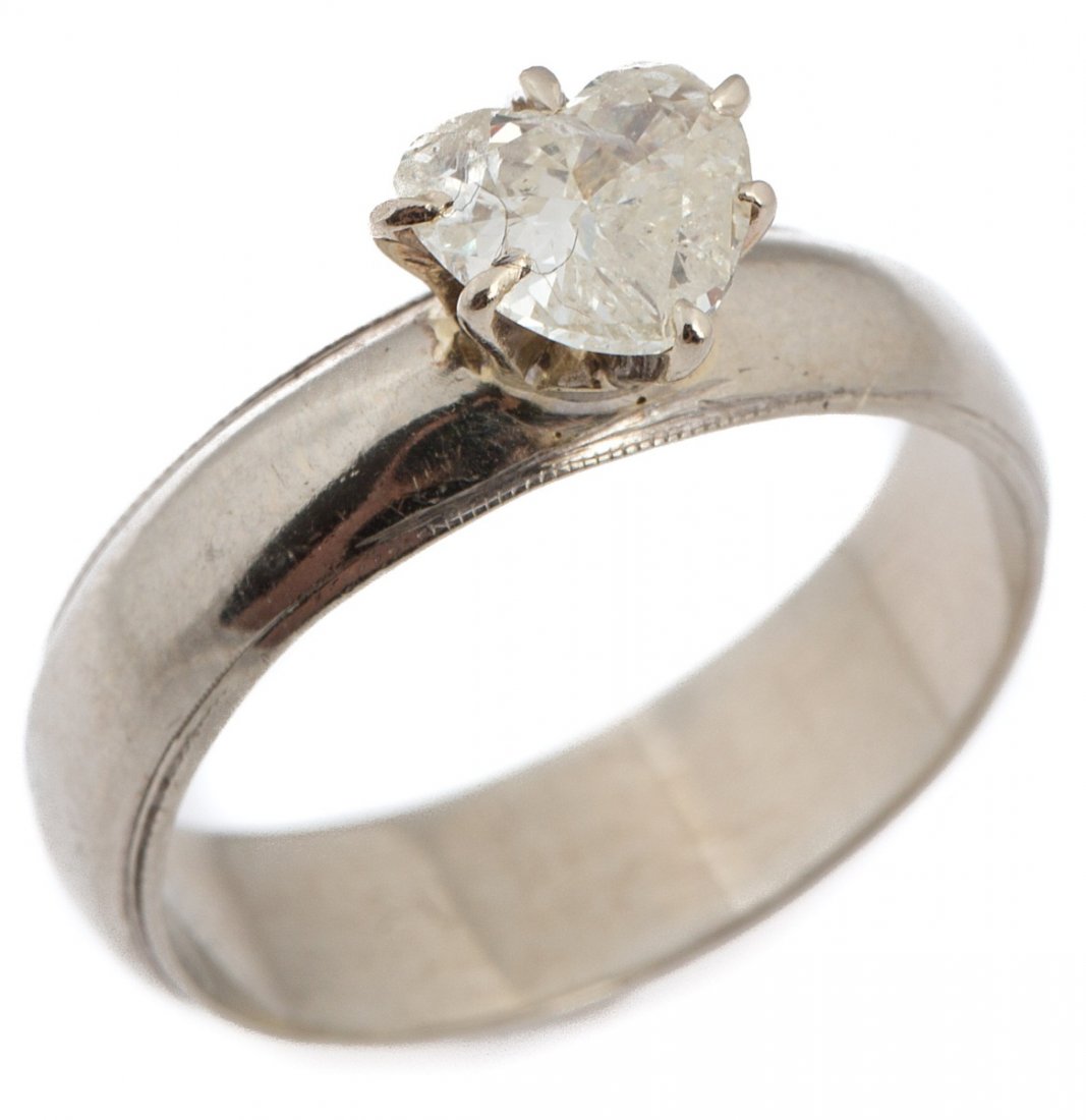LADIES 14K WHITE GOLD HEART DIAMOND SOLITAIRE RING: LADIES 14K WHITE GOLD HEART DIAMOND SOLITAIRE RING 14K white gold diamond solitaire engagement ring. Approximately a 0.65 ct heart shaped diamond of I clarity and H color. Weight: 3.2g Size: 6.5