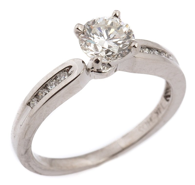 LADIES 14K GOLD DIAMOND SOLITAIRE ENGAGEMENT RING: LADIES 14K GOLD DIAMOND SOLITAIRE ENGAGEMENT RING Ladies 14K white gold engagement ring. Round brilliant cut diamond of approximately 0.69 ct, VS-2 clarity and I color. Accented by 8 full cut diamonds