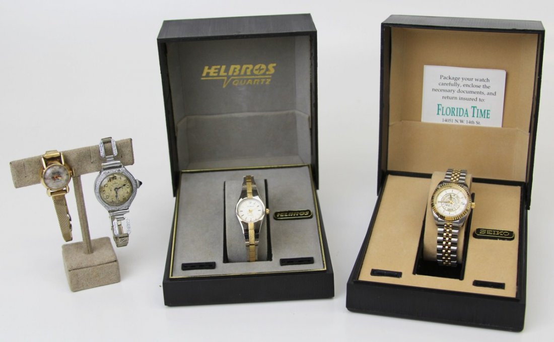 (4) LADIES MANUAL & AUTOMATIC WRIST WATCHES: (4) LADIES MANUAL & AUTOMATIC WRIST WATCHES Four ladies automatic and manual wrist watches; Includes University of Florida Seiko with case, two tone gold and silver Helbros with case, 10K rolled gold 