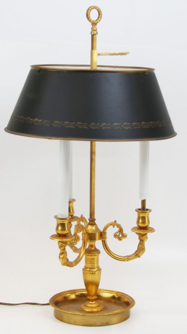 CONVERTED BRASS DESKTOP CANDLE LAMP: CONVERTED BRASS DESKTOP CANDLE LAMP Brass desktop candle lamp, converted to electric, comes with charcoal shade. Size: 24 x 14"