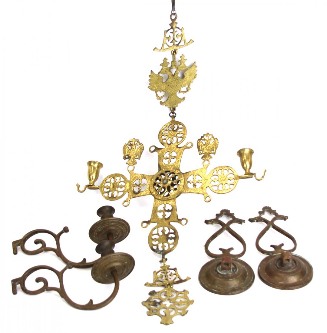 (3) BRASS WALL CANDLE HOLDERS: (3) BRASS WALL CANDLE HOLDERS Group of brass wall candle holders includes: a pair of 19th century wall sconces with removable candle portion, and a 20th century, decorative wall hanging with eagle mot