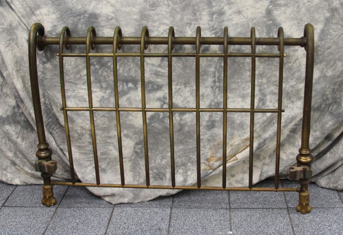 VINTAGE GILDED CLAW FOOT BRASS BED FRAME: Vintage gilded brass claw foot bed frame. EST. $75 - 150. Size: 54 x 39 x 73"