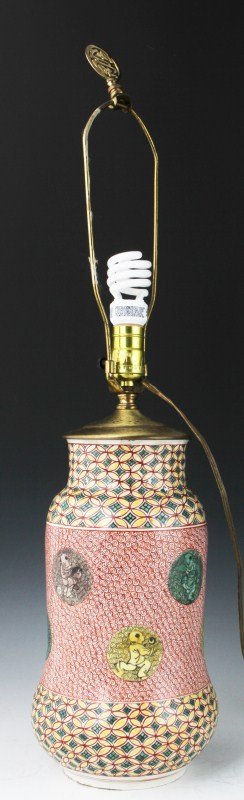 CHINESE MEIJI PERIOD EARTHENWARE VASE: CHINESE MEIJI PERIOD EARTHENWARE VASE Chinese earthenware vase, Meiji period. Hand painted to show children playing. The vase has been converted to a lamp by the addition of the lamp fixtures,but has
