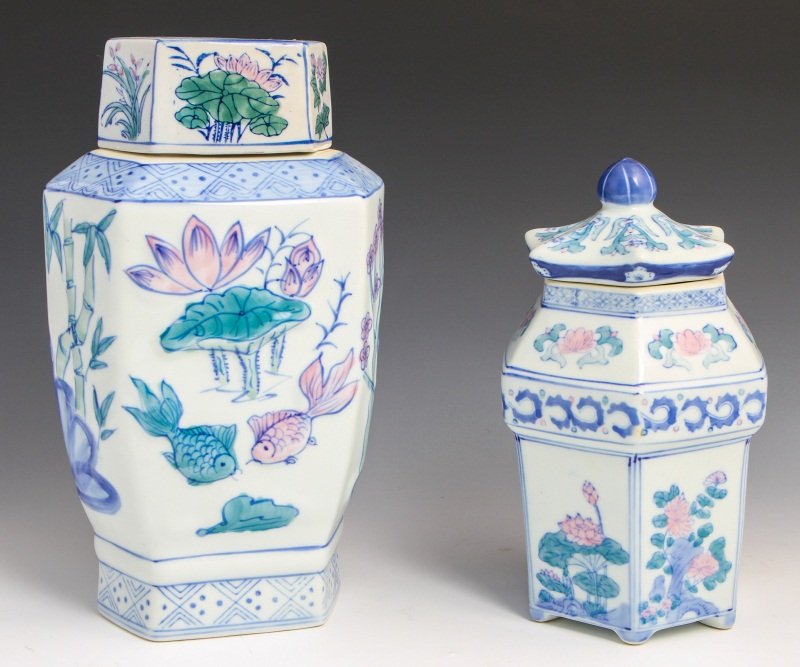 (2) CHINESE DECORATED PORCELAIN GINGER JARS: (2) CHINESE DECORATED PORCELAIN GINGER JARS Two Chinese decorated porcelain ginger jars. Both decorated with flowers and plants. Larger jar has koi fish and bamboo. Signed on base. Size: 12, 10"