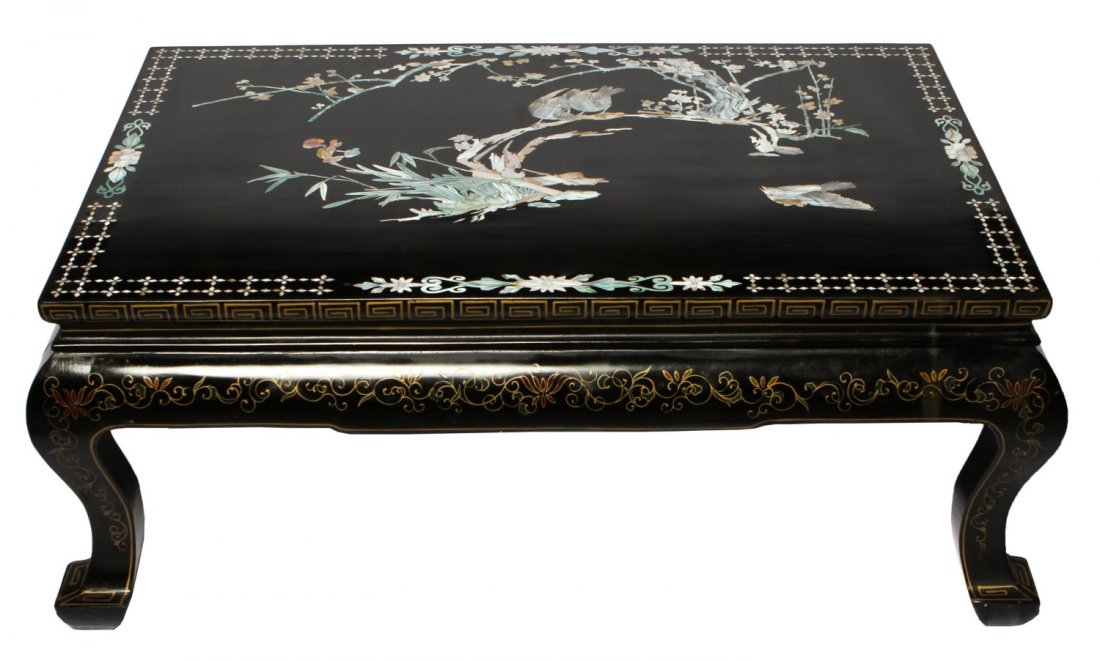 CHINESE BLACK LACQUER TABLE MOP BIRD MOTIF INLAY: CHINESE BLACK LACQUER TABLE MOP BIRD MOTIF INLAY Chinese black lacquer table with mother of pearl inlay, bird motif, very well done. Comes with custom made glass top. Size: 43 x 27 x 18"