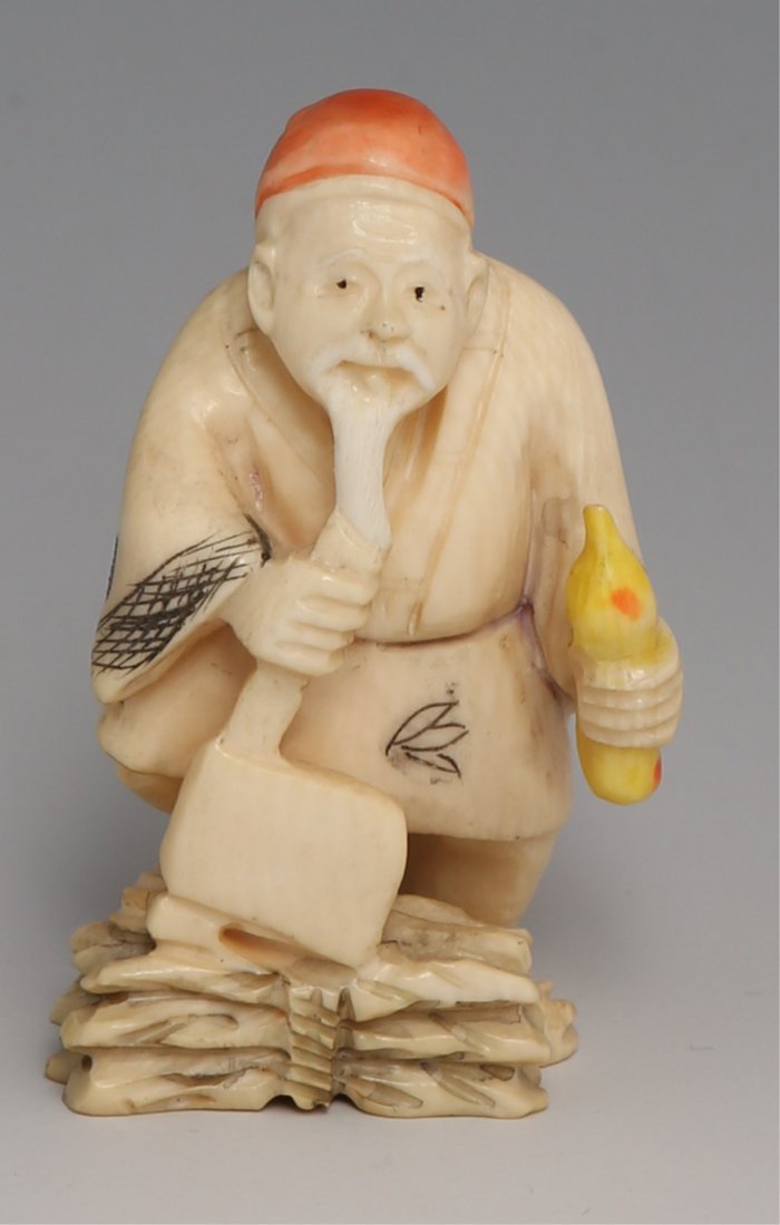 JAPANESE CARVED POLYCHROME NETSUKE WOODSMAN: JAPANESE CARVED POLYCHROME NETSUKE WOODSMAN Carved ivory Japanese netsuke figure of woodsman, polychrome, signature to bottom. Weight: 23g Size: 1.75 x 1 x .5"