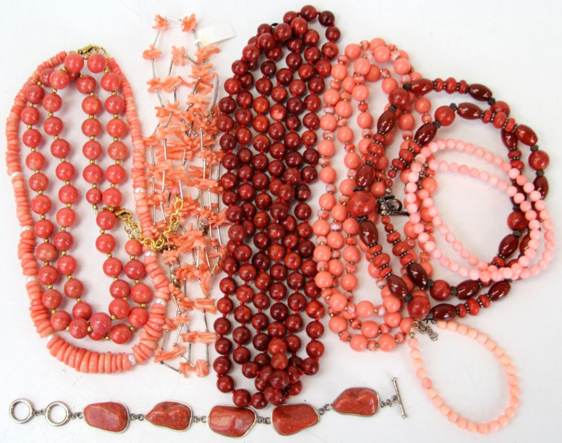 MIXED LOT OF PINK AND RED CORAL JEWELRY: MIXED LOT OF PINK AND RED CORAL JEWELRY Mixed lot of pink and red coral beaded jewelry, includes eight necklaces and two bracelets. Weight: 600.9g