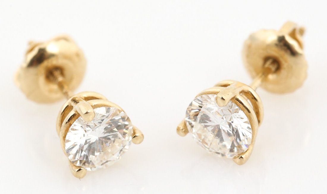 LADIES 14K YELLOW GOLD 1 CTW DIAMOND STUDS: LADIES 14K YELLOW GOLD 1 CTW DIAMOND STUDS Ladies 14K yellow gold 1 ctw round diamond studs with screw-back posts. Includes a Leo diamond IGI Summation of Appraisal that describes the diamonds as F-G 