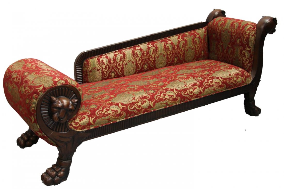 WOOD AND PATTERNED UPHOLSTERY FAINTING COUCH: WOOD AND PATTERNED UPHOLSTERY FAINTING COUCH Dark wood couch with ornately patterned burgundy, gold and black upholstery; jaguar sculptural elements with bulbous feet. Made in Indonesia. Size: 30 x 90