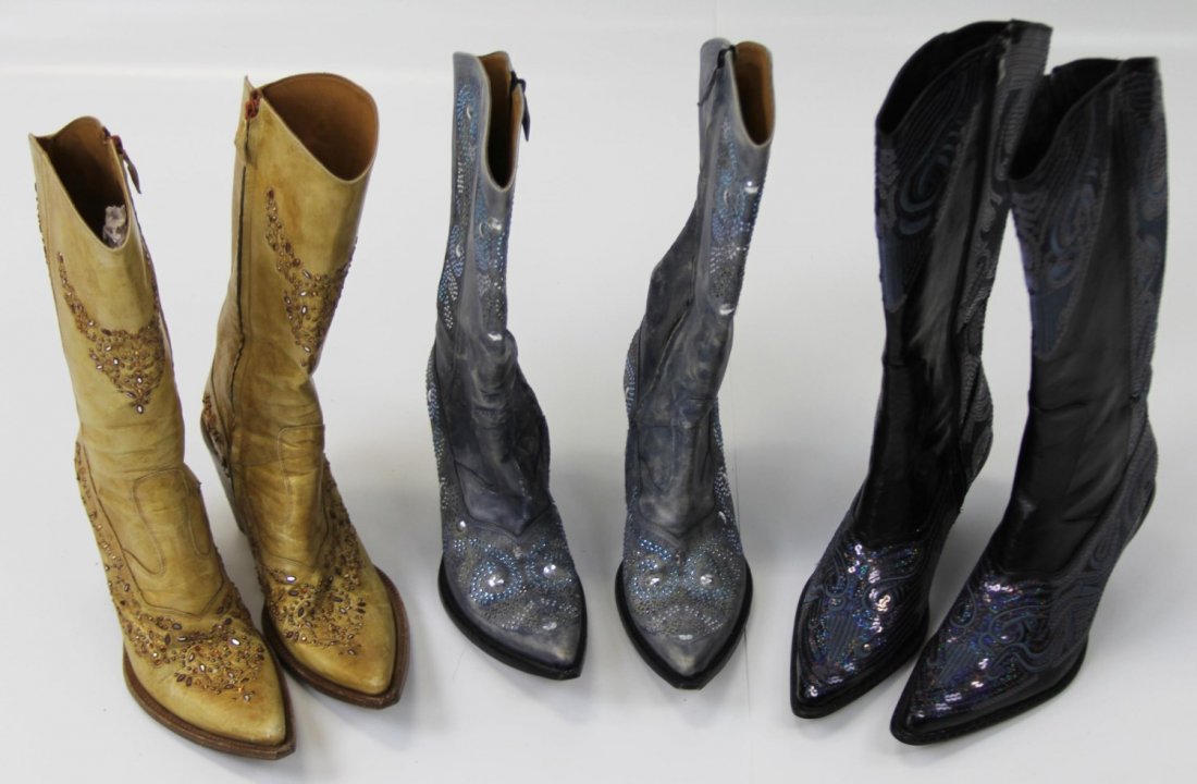 (3) PAIRS OF DECORATIVE COWBOY BOOTS: (3) PAIRS OF DECORATIVE COWBOY BOOTS Three pairs of decorative cowboy boots. Includes: two pairs of Damy, and one pair by John Fashion. Size: 10