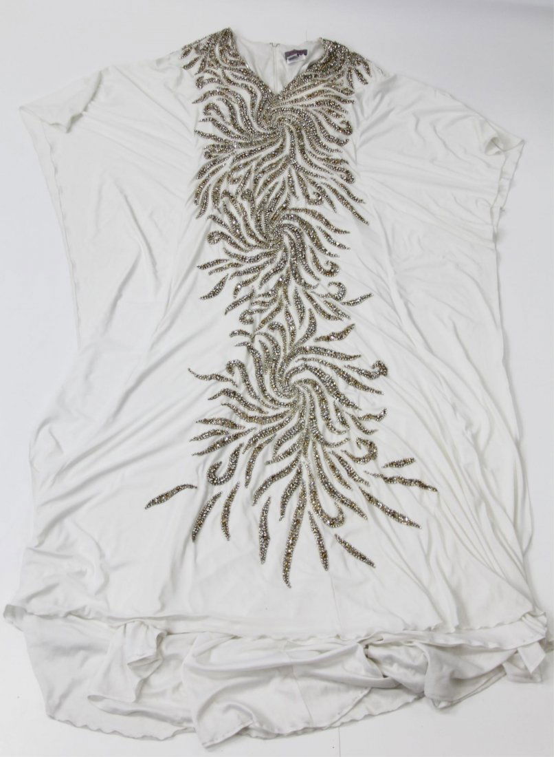 JOVANI WHITE & RHINESTONE DRESS: JOVANI WHITE & RHINESTONE DRESS Jovani white dress with swirling rhinestone pattern on front and back. Size: 6, 72" neck to hem