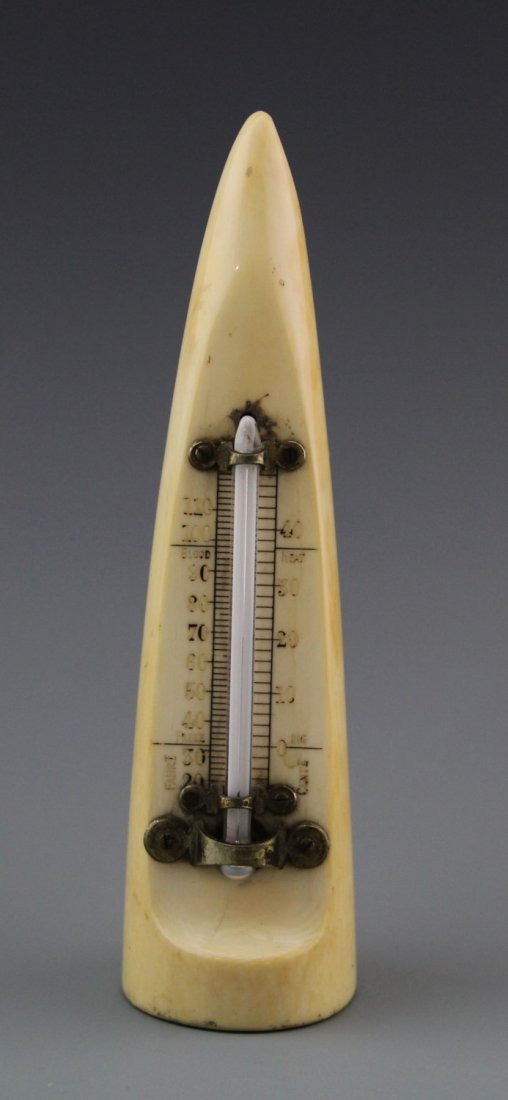 ANTIQUE CARVED IVORY THERMOMETER: ANTIQUE CARVED IVORY THERMOMETER Carved ivory tusk fitted with mercury tube. Weight: 223.3 g Size: 6"