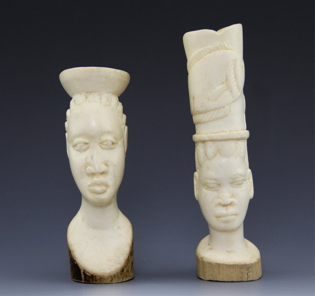 PAIR OF CARVED IVORY TRIBAL AFRICAN BUSTS: PAIR OF CARVED IVORY TRIBAL AFRICAN BUSTS Pair of African carved ivory tribal female busts. Weight: 318 g Size: 5 - 6"