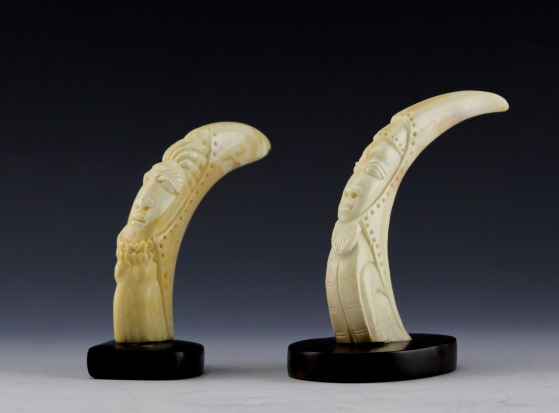 (2) AFRICAN IVORY TRIBAL CARVING HIPPO TUSKS: (2) AFRICAN IVORY TRIBAL CARVING HIPPO TUSKS Lot of two antique African hippo ivory tusk carvings; both depict sunk relief of male and female figures. Screw-attached to wood bases. Weight: 245.1g tota