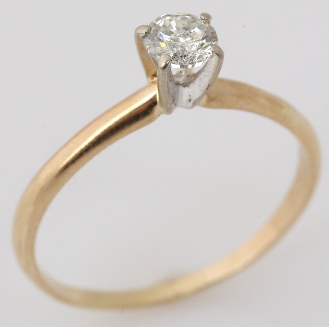 LADIES 14K DIAMOND SOLITAIRE ENAGEMENT RING 0.55CT: LADIES 14K DIAMOND SOLITAIRE ENAGEMENT RING 0.55CT Ladies diamond solitaire engagement ring, 14k yellow gold with round prong set diamond approximately 0.55 cts. Weight: 2.4g Size: 11