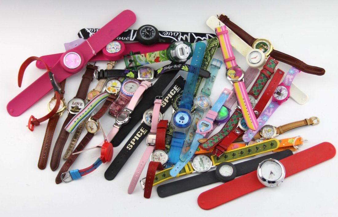 (34) JUVENILE THEMED COSTUME WATCHES: (34) JUVENILE THEMED COSTUME WATCHES A large lot of juvenile theme fashion watches. Included are Mickey Mouse, Cat in the Hat, Tinker Bell, Tweety Bird, Piglet, Spice Girls, and more. Several slap bra