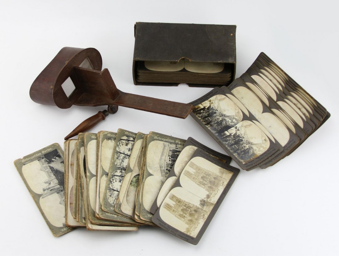 ANTIQUE STEREO-OPTIC VIEWER & SLIDE LATE 19TH C: ANTIQUE STEREO-OPTIC VIEWER & SLIDE LATE 19TH C Antique stereo-optic viewer with assortment of slides, late 19th C., includes buildings, war-time images, etc. Size: 13 x 5.5"