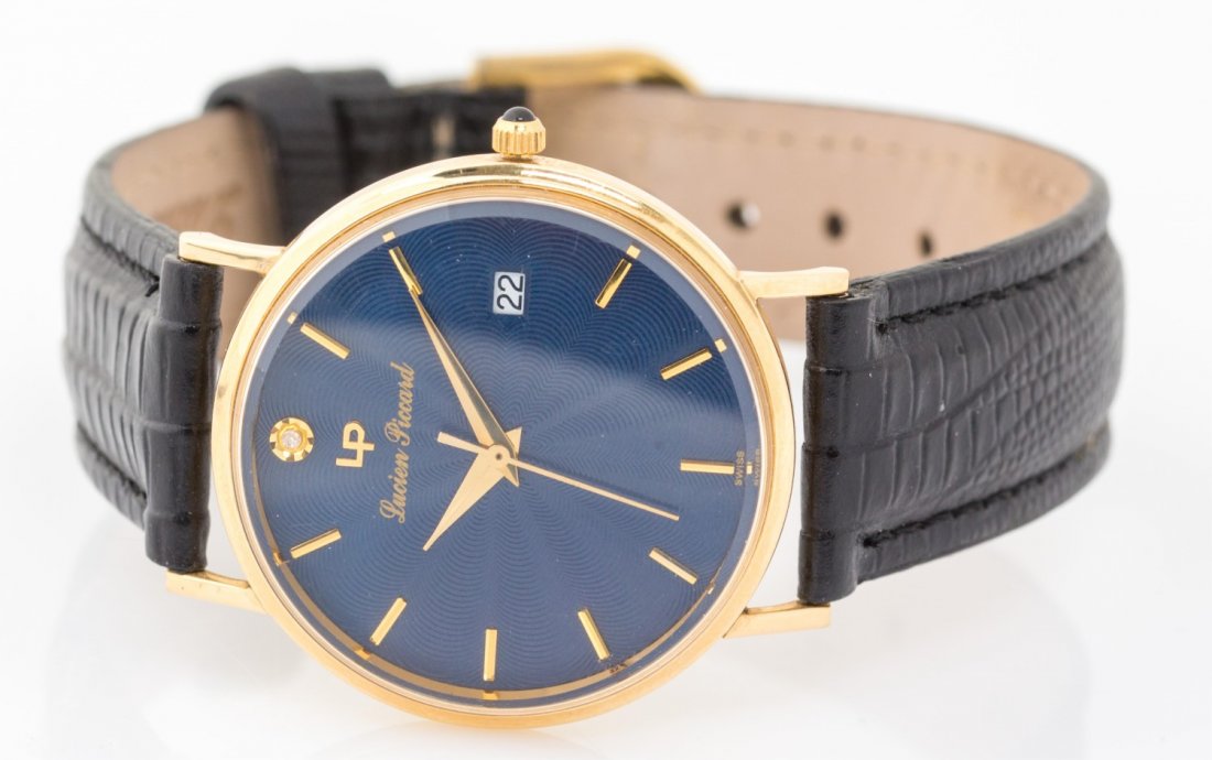 MENS LUCIEN PICCARD WRISTWATCH 14K CASE: MENS LUCIEN PICCARD WRISTWATCH 14K CASE Men's Lucien Piccard wristwatch, #22478, 14k case, with leather band. Weight: 26.3g total Size: 33mm