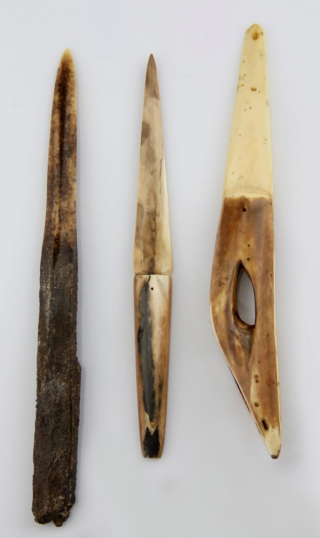 (3) FOSSILIZED WALRUS IVORY LETTER OPENERS: (3) FOSSILIZED WALRUS IVORY LETTER OPENERS Three fossilized walrus ivory letter openers. Lengths: 9.5", 9", and 8.25". Weight: 171.2g total