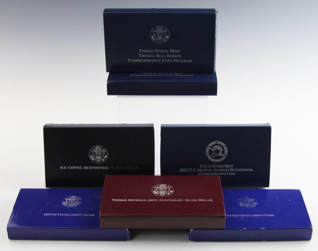 (7) US PROOF COMMEMORATIVE COINS 1986-2004: (7) US PROOF COMMEMORATIVE COINS 1986-2004 Includes: (2) 1986 Liberty Coin Set, 1993 Thomas Jefferson 250th Anniversary Silver Dollar Proof, 2002 Military Academy Bicentennial, Capitol Bicentennial Do