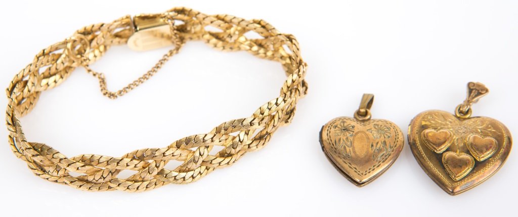 (3) ANTIQUE GOLD FILLED LOCKETS & BRACELET: (3) ANTIQUE GOLD FILLED LOCKETS & BRACELET Lot of three antique gold filled jewelry pieces; Includes 12K gold filled 8" braided bracelet, and 1/20 12K on sterling triple heart locket and 1/20 10K sing