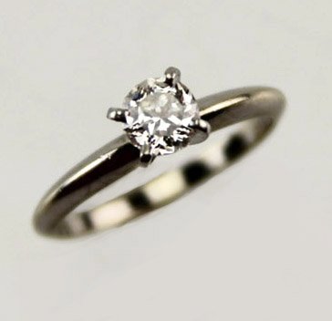 LADIES 14K DIAMOND SOLITAIRE ENGAGEMENT RING: LADIES 14K DIAMOND SOLITAIRE ENGAGEMENT RING Ladies 14K white gold prong-set solitaire ring set with modified round brilliant cut diamond of 0.51Ct, VS1 clarity G color. Accompanied by a March 2015 Re
