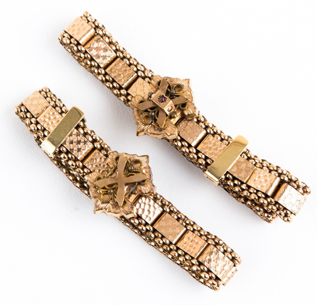 PAIR OF ART DECO GOLD FILLED FLAT LINK BRACELETS: PAIR OF ART DECO GOLD FILLED FLAT LINK BRACELETS Pair of art deco, gold filled, bead and flat link bracelets. Both with decorative clasps, one with a 1.5mm garnet, and two 1mm seed pearls. Weight: 41.
