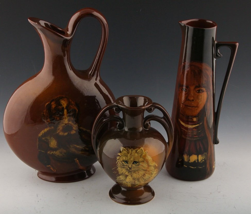 3 SIGNED HAND PAINTED POTTERY VASES: 3 SIGNED HAND PAINTED POTTERY VASES Lot of three pottery ceramic vases, signed "JL" on underside, decorated with Pima indian girl, cat, and hunting dog. All are marked on underside. Size: 7" - 12"