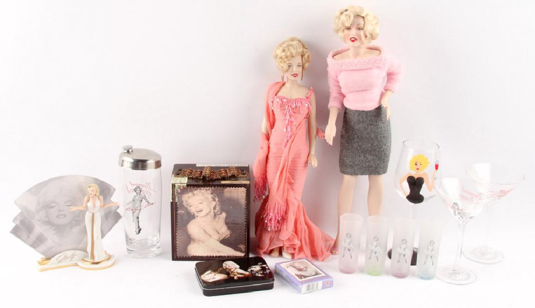 MARILYN MONROE SHOT GLASSES FIGURINE & MORE: MARILYN MONROE SHOT GLASSES FIGURINE & MORE Variety of Marilyn Monroe memorabilia, to include two Franklin Mint vinyl "Gentlemen Prefer Blondes" doll, Franklin Mint "Sweater Girl" porcelain doll, four