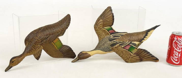 Carl Malstrom Carved Ducks: Pair carved wooden duck wall plaques. Signed "Made By Carl Malstrom, Long Cove, Maine". Depicting male and female pintail ducks. Original paint. Minor chip losses. Original paint. 11 1/2" and 14 1/2".