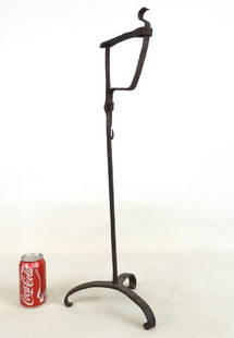 18th c. Light Stand: 18th c. forged iron light stand. Tripod base with inverted feet. 27" Ht..