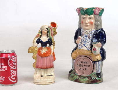 Staffordshire Lot: Lot including toby mug "HOME BREWED ALE" (11 1/4" Ht.), and woman with parrot (8 3/4" Ht.). Imperfections.