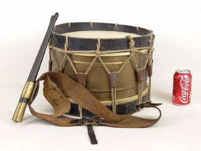 Early Drum: Early drum (14" D., 10" Ht.), along with belt and sticks.