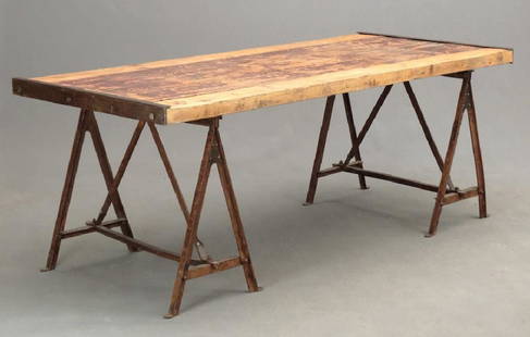 Iron And Wood Table: Custom iron and wood table. Top lays on iron bases and is removable. Top 34" x 79", 29" Ht..