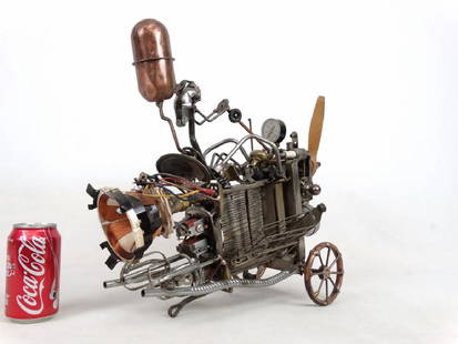 Steam Punk Airplane Sculpture: Steam punk metal airplane sculpture. 16" x 16 1/2" Ht.. Labeled Sonny Dalton.