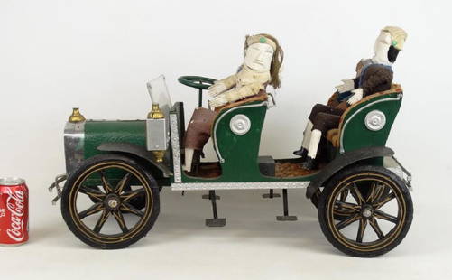 Folk Art Car With Riders: Folk art wood and tin car with riders. 1903 Ford. 25" x 12" x 19" Ht..