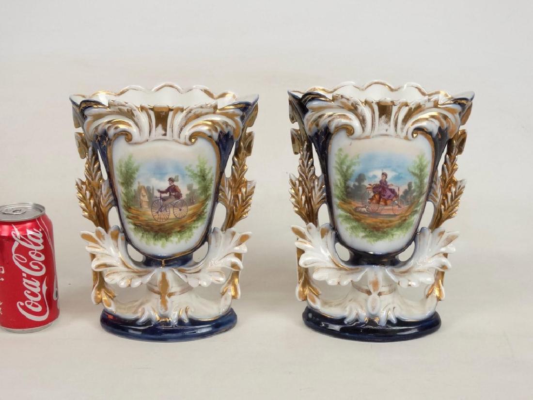 Pair 19th c. Porcelain Garnitures With Boneshakers (1 of 10)