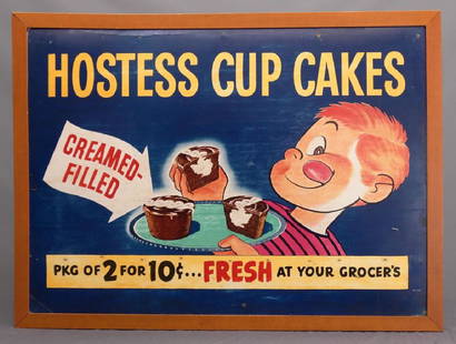 "HOSTESS CUP CAKES" Advertising Sign: Vintage cardboard sign "HOSTESS CUP CAKES/CREAM FILLED...". Wood frame. Frame overall. 34 1/2" x 47".