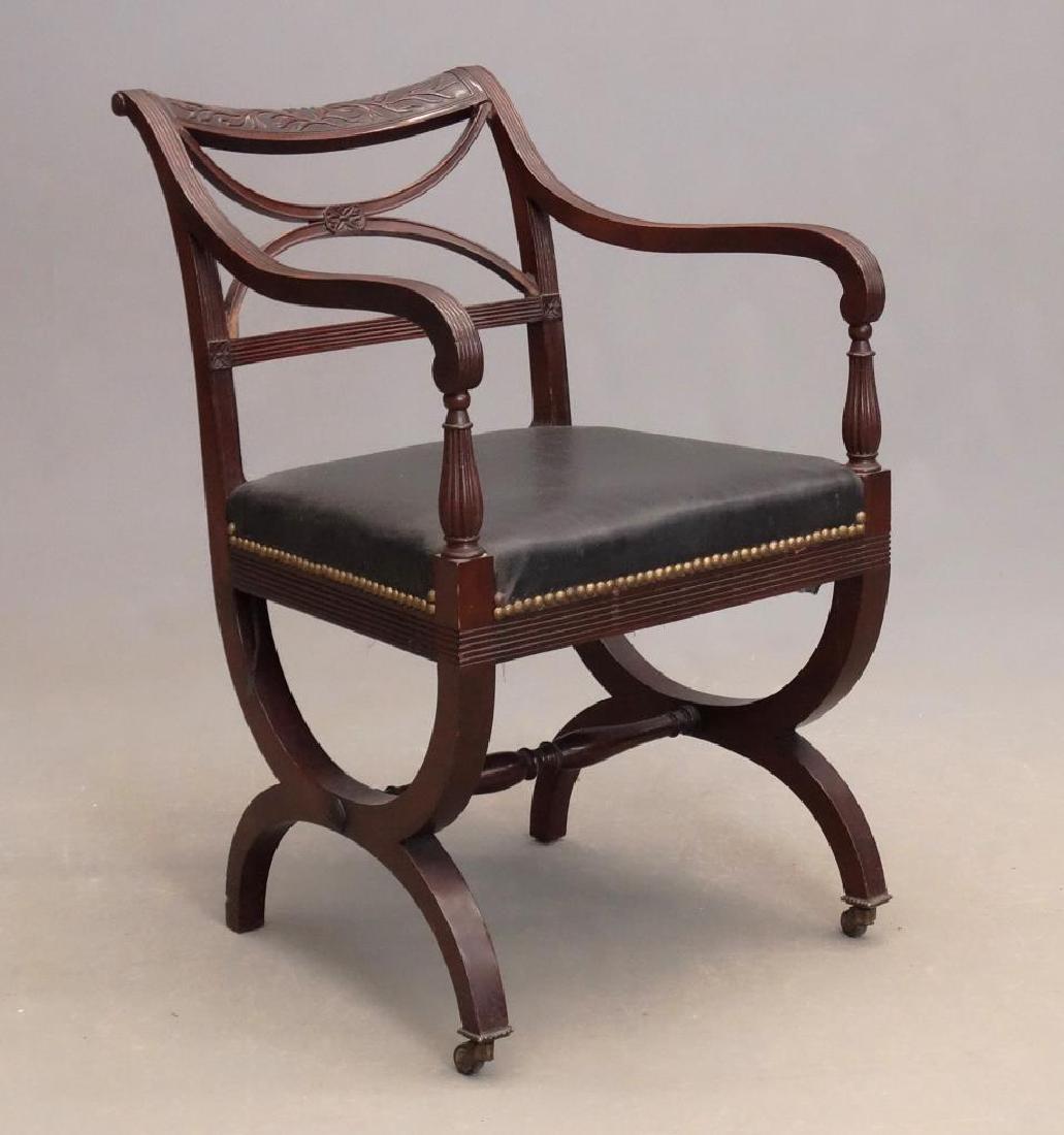 Style Of Duncan Phyfe, Curule Arm Chair: Style of Duncan Phyfe, curule arm chair. Mahogany. 19" seat Ht., 32 3/4" Ht..