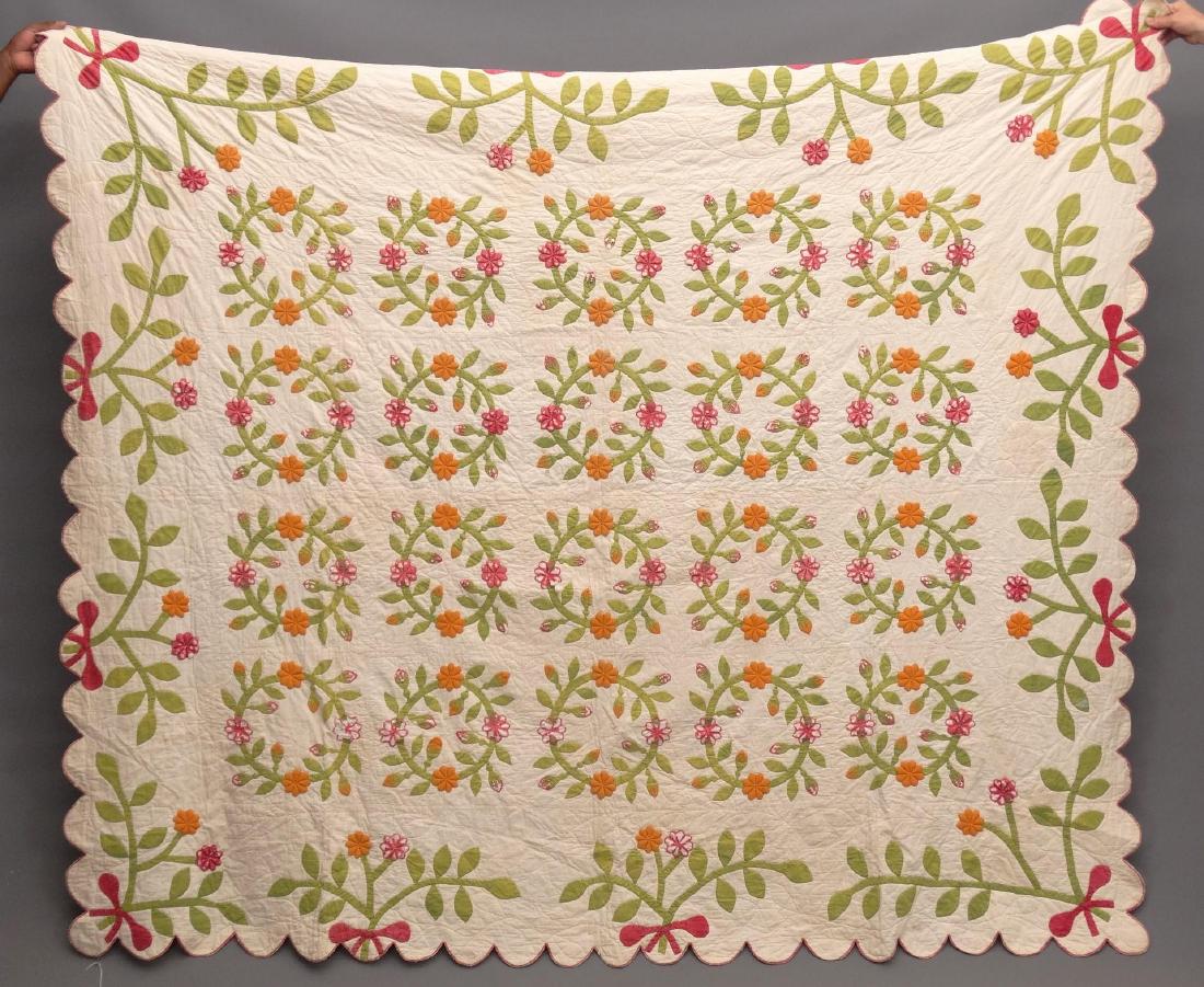 Quilt: 19th c. red and green floral applique quilt. As found. 77" x 95".