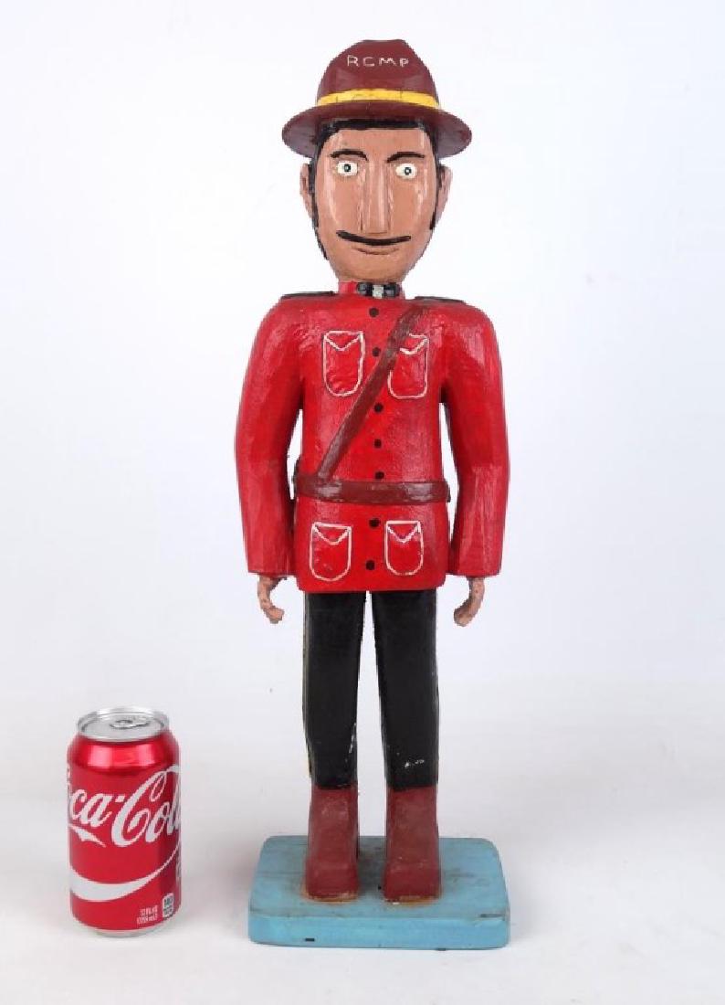 Brian Fancy Nova Scotia Folk Art: Brian Fancy Nova Scotia folk art carved figure. 21" Ht..