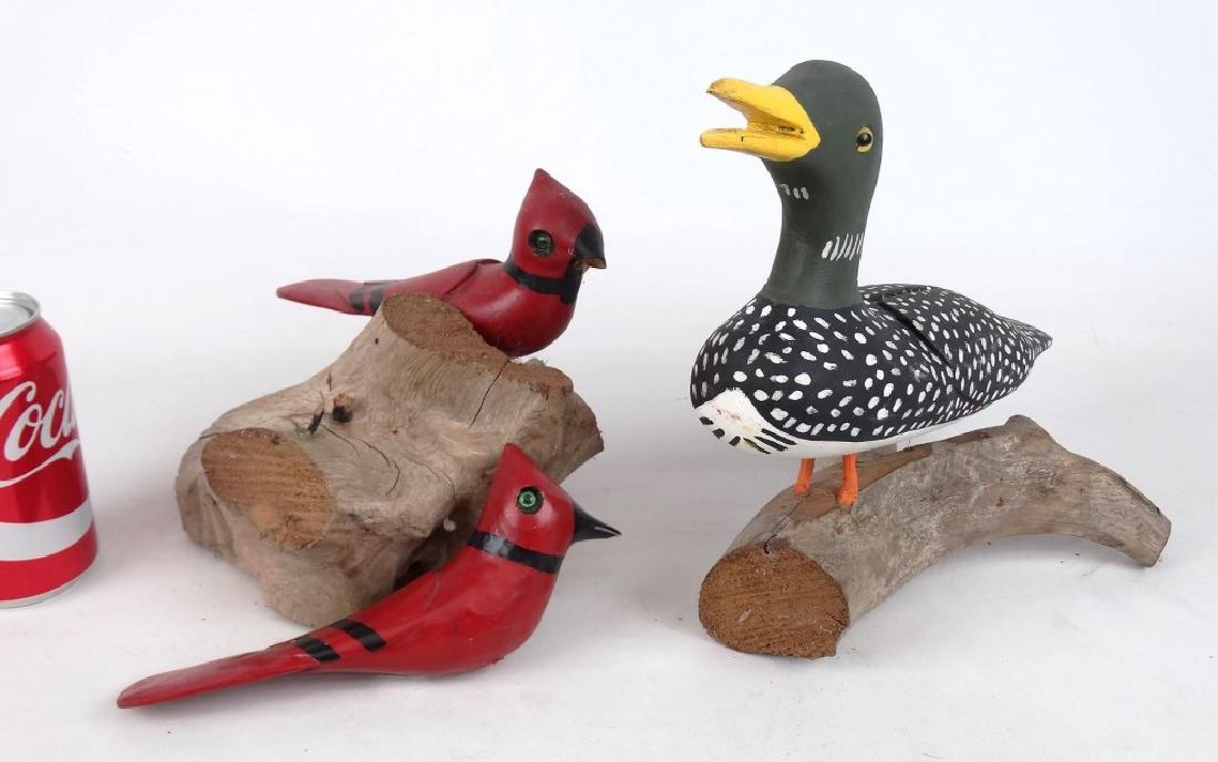 John Foster Nova Scotia Folk Art: John Foster Nova Scotia, (2) folk art wooden painted birds on driftwood. 7" to 11" L..