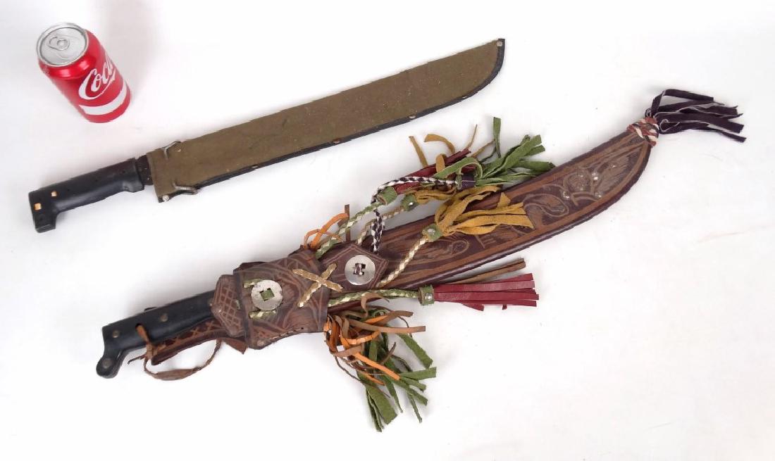 Machetes Lot: Lot (2) machetes. 23" and 26" L..