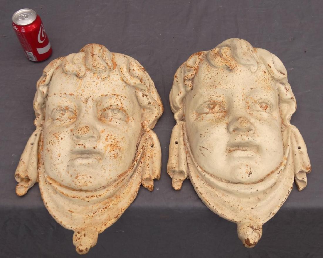 Pair Cast Iron Masks (1 of 3)