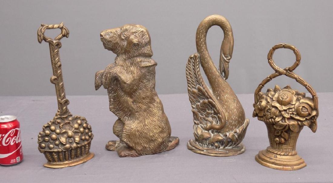 Doorstops: Lot (4) brass doorstops. 12" to 15" Ht..